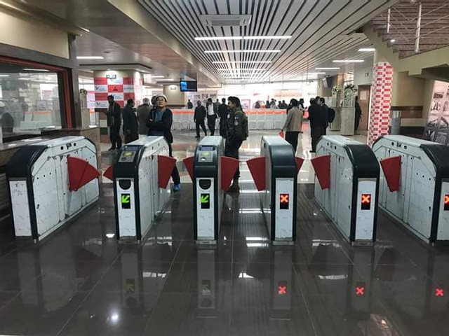 Ticket scanner machines at orange line train stations